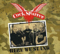 COCK SPARRER 'HERE WE STAND' LP (Clear w/ Black Splatter Vinyl)
